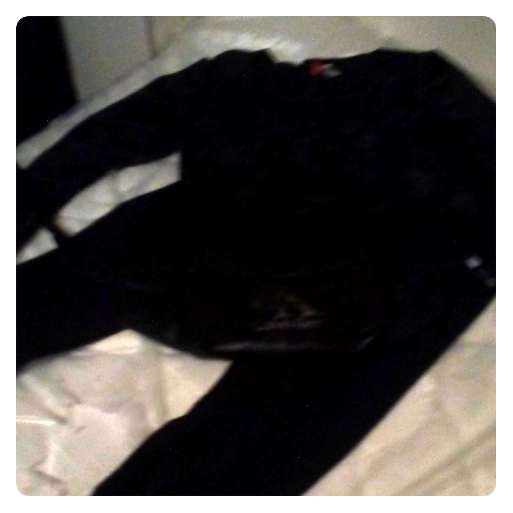 Silk crop top black jeans and a Calvin McLean fann